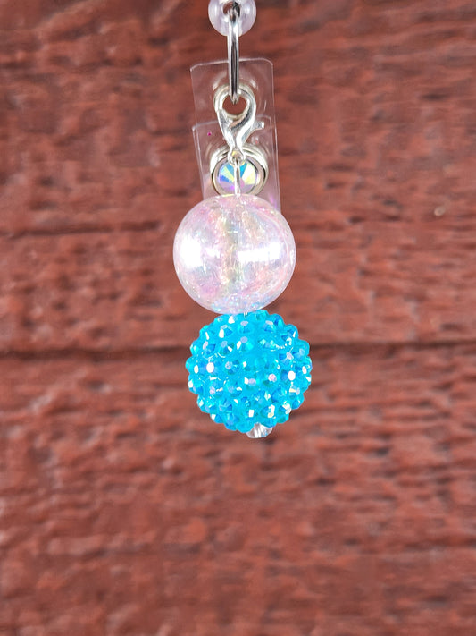 Clear crackle and blue bead charm