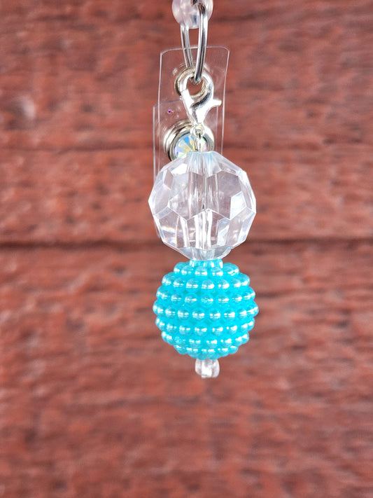 Clear dimond and light blue bead charm